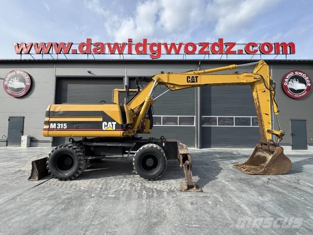 CAT M 315 Bagri na kolesih