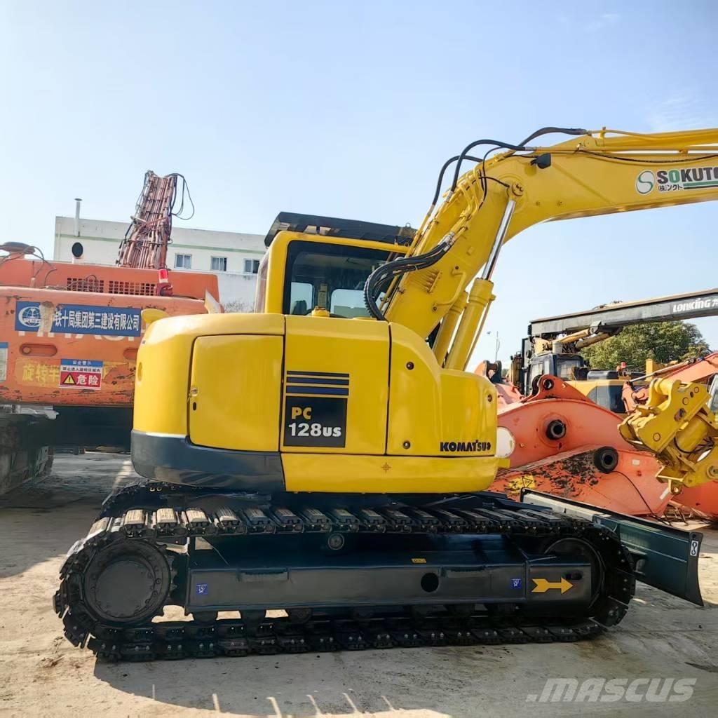 Komatsu PC 128 US Midi bagri 7t – 12t