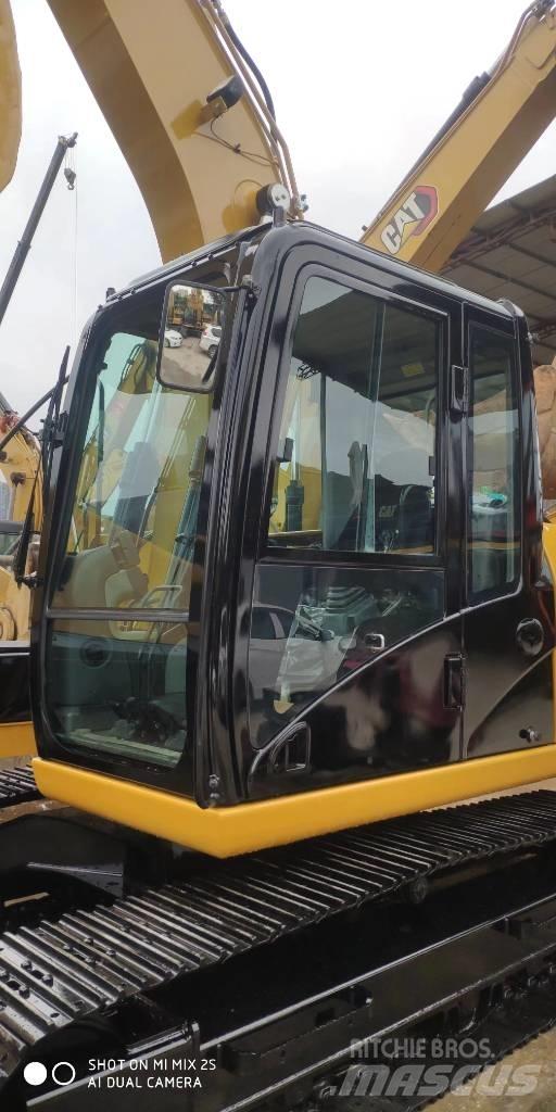 CAT 2021 CAT 313D2GC Bagri na kolesih