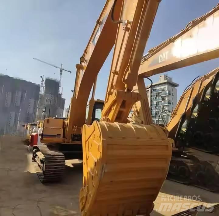 CAT CAT323B Midi bagri 7t – 12t