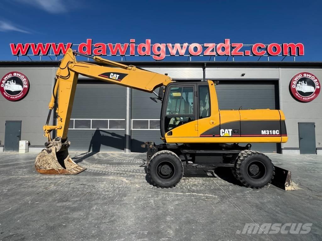 CAT M 318 C Bagri na kolesih