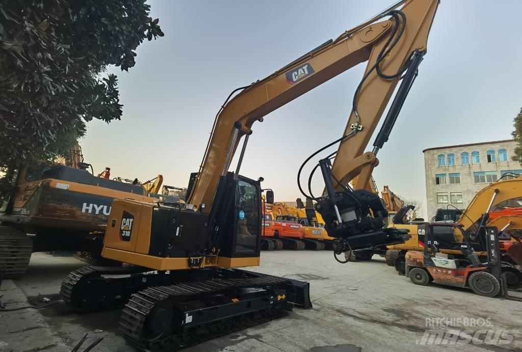 CAT 310 Bagri goseničarji