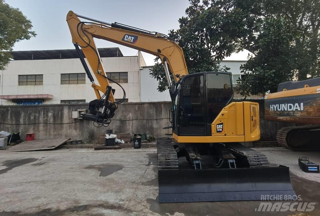 CAT 310 Bagri goseničarji