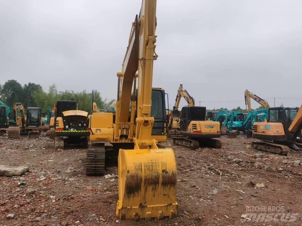 Komatsu PC 130 Midi bagri 7t – 12t