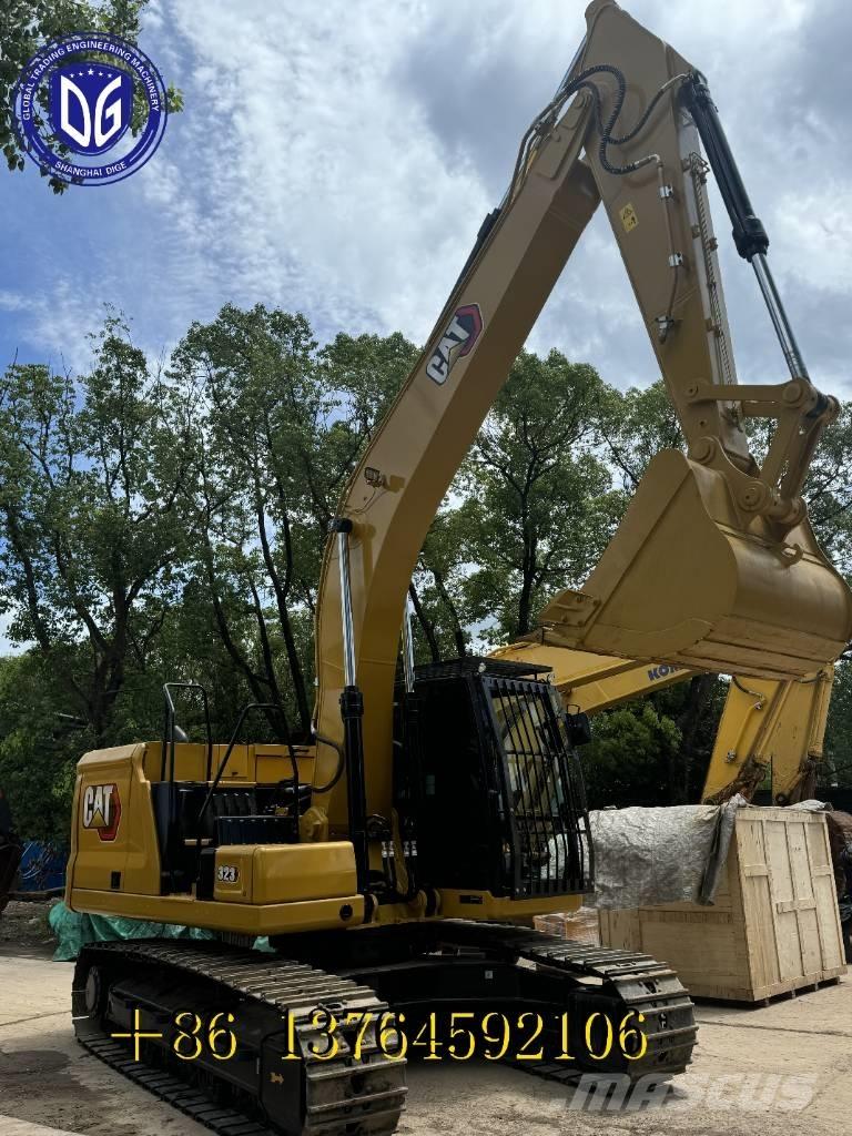 CAT 323 Bagri goseničarji