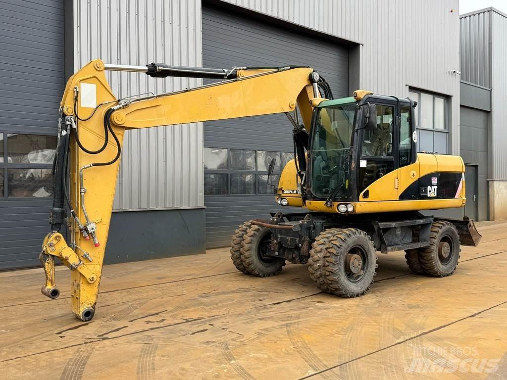 CAT M315D Bagri na kolesih