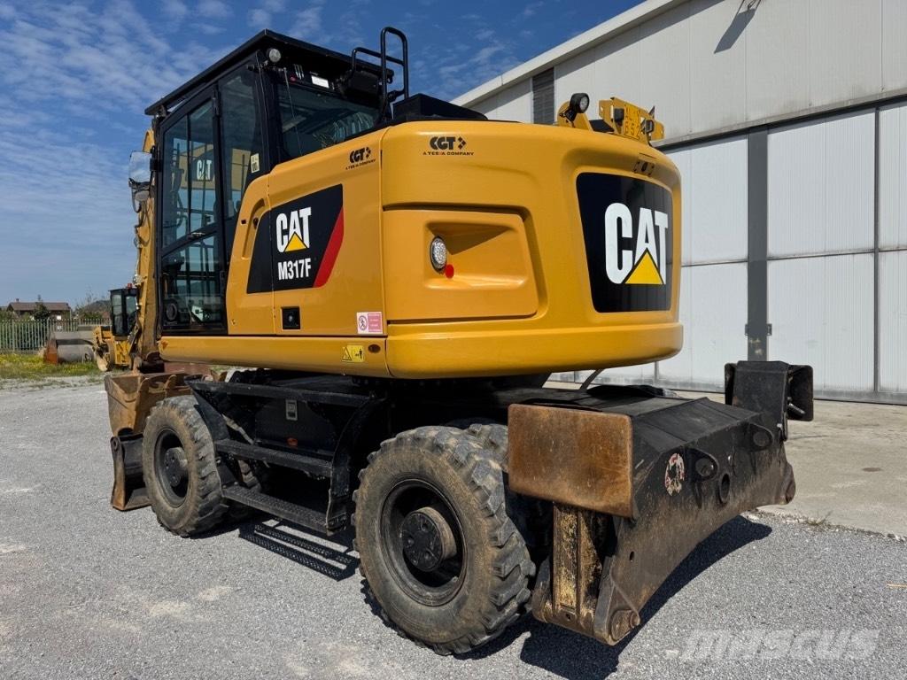 CAT M317F Bagri na kolesih