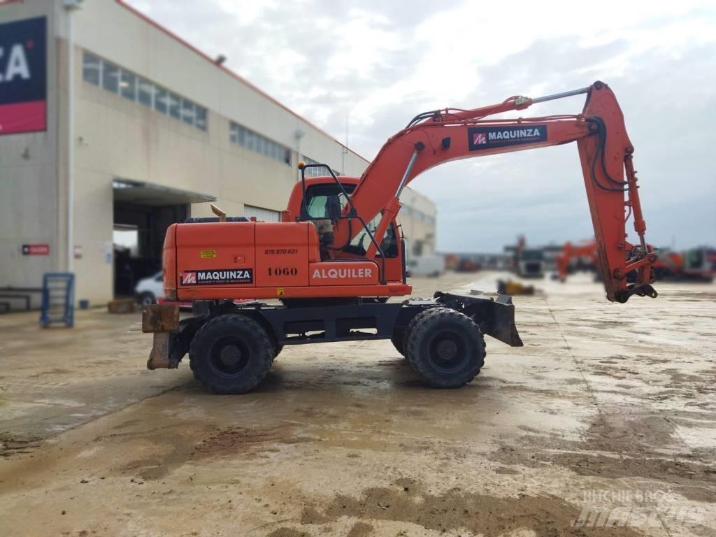 Doosan DX 140 W Bagri na kolesih