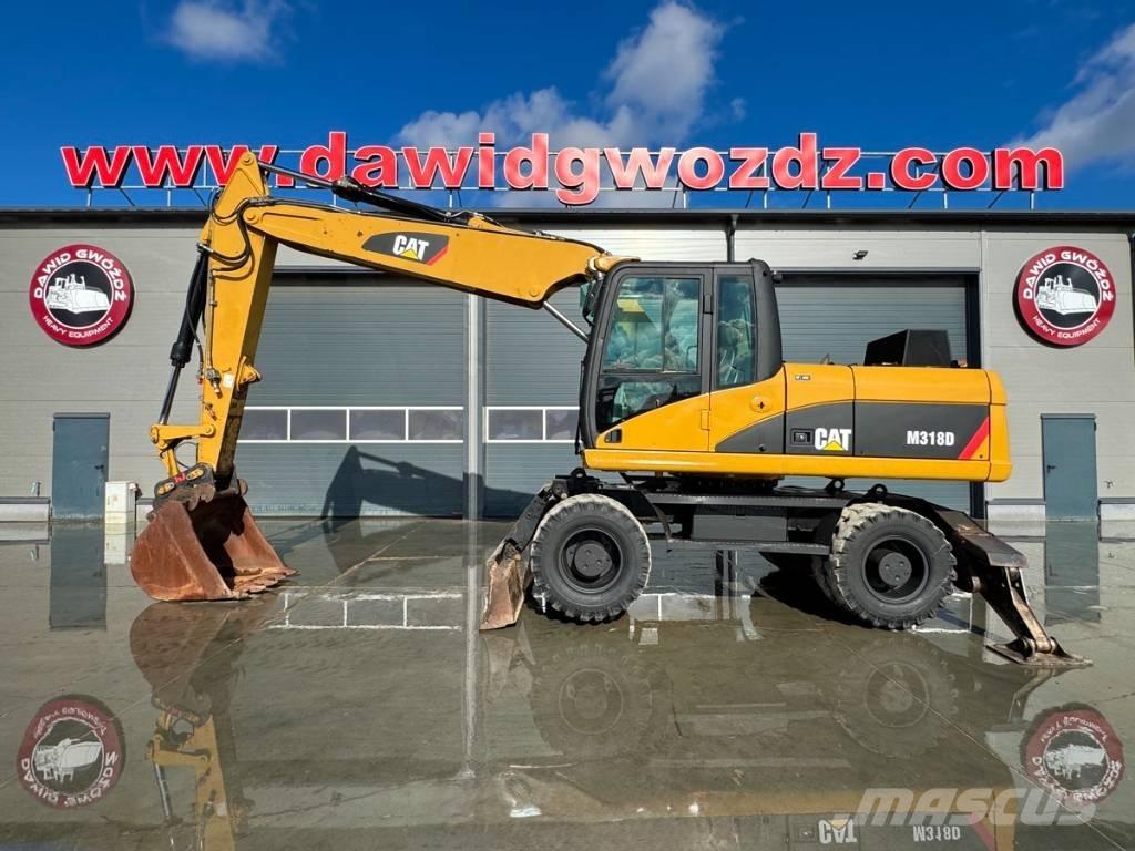 CAT M 318 D Bagri na kolesih