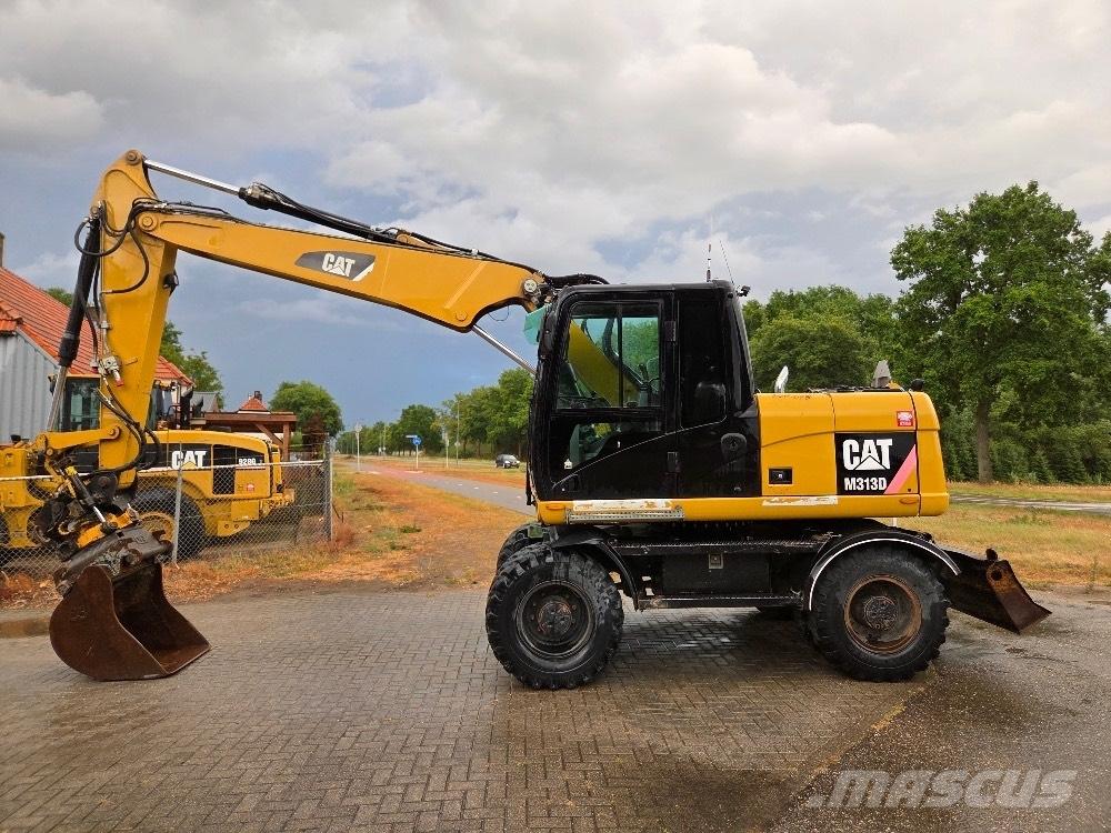 CAT M313D Bagri na kolesih