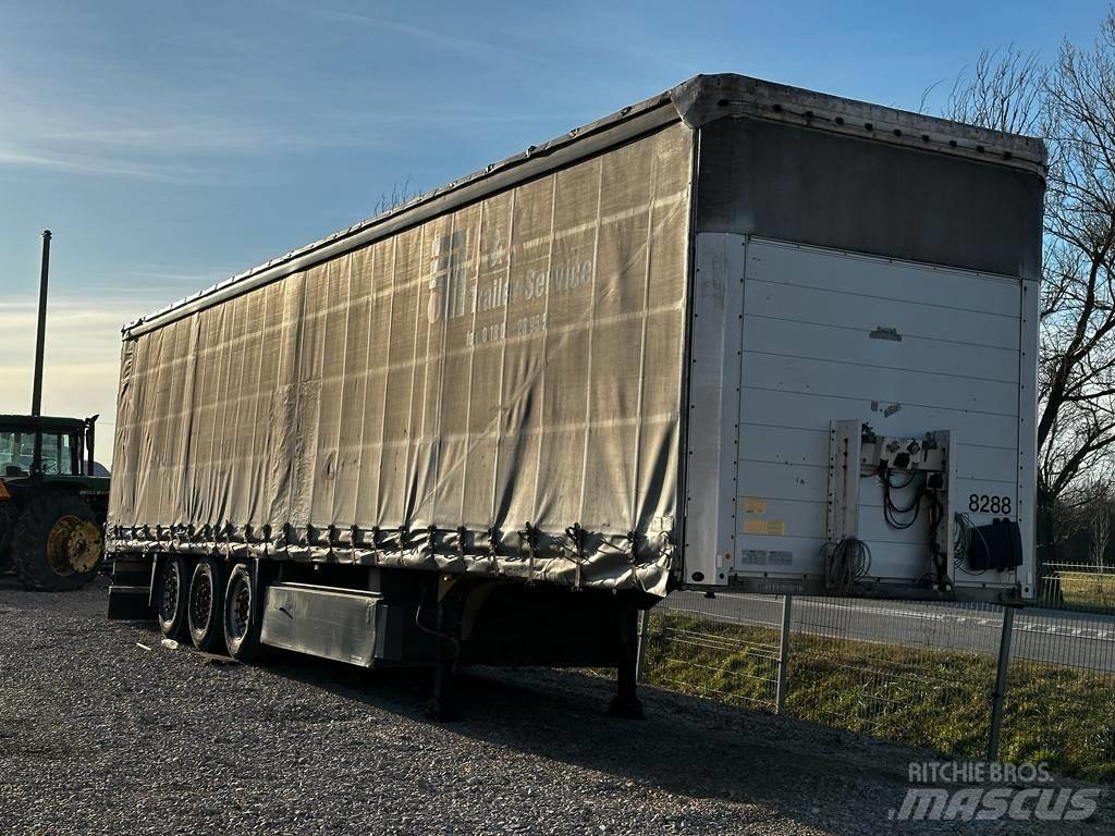 Schmitz SCS 24 L Prikolica s ponjavo