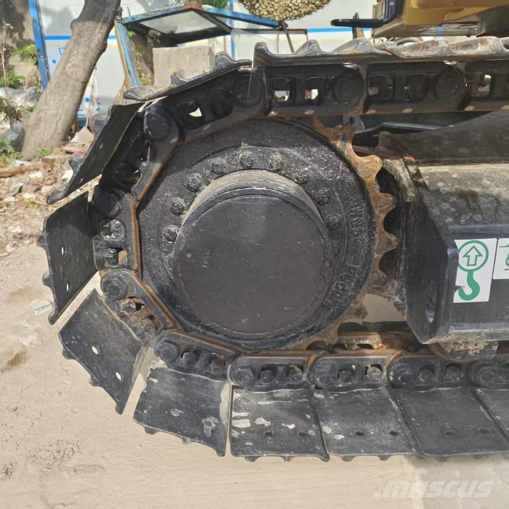 CAT 310 Bagri goseničarji