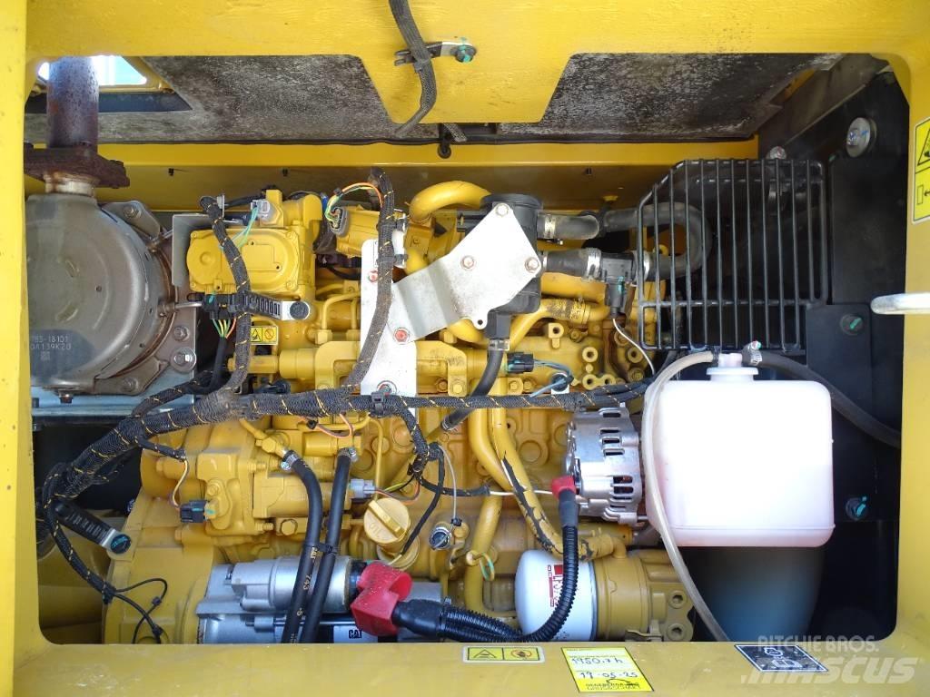 CAT 310 Bagri goseničarji