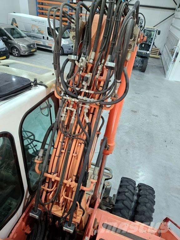 Atlas 1404 Bagri na kolesih