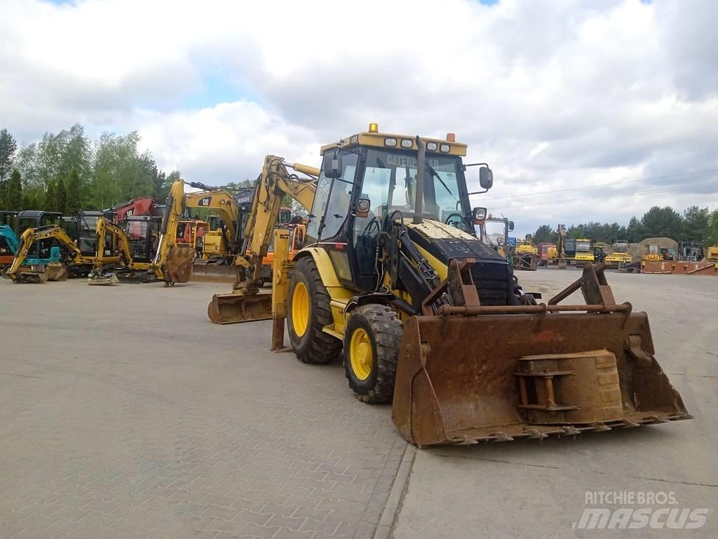 CAT 428 D Rovokopači