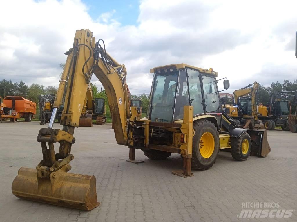 CAT 428 D Rovokopači