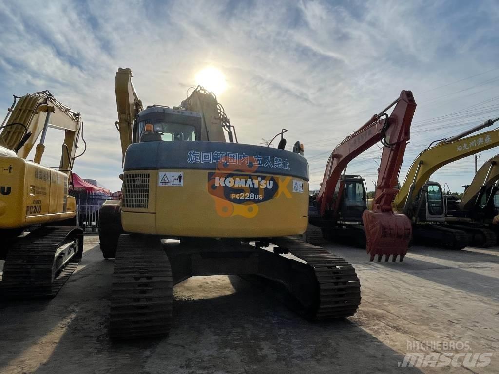 Komatsu PC 228 US Bagri goseničarji