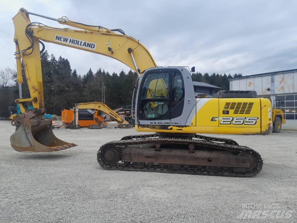 New Holland E 265 Bagri goseničarji