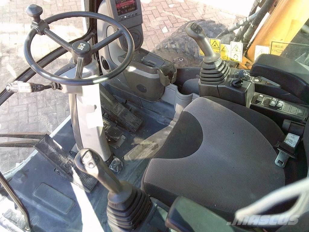 CAT M313D Bagri na kolesih