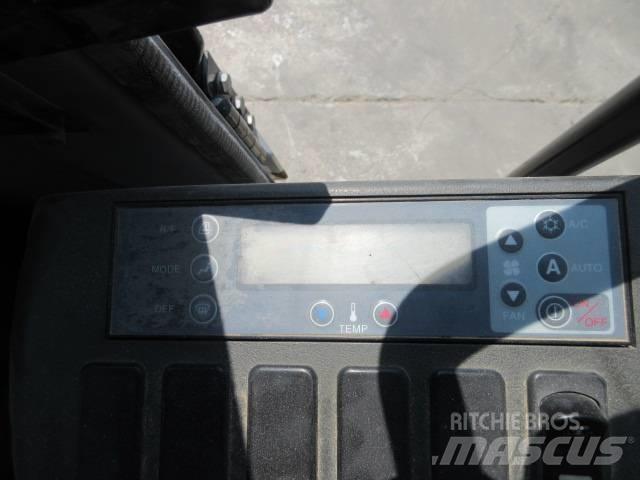 New Holland E 245 Bagri goseničarji