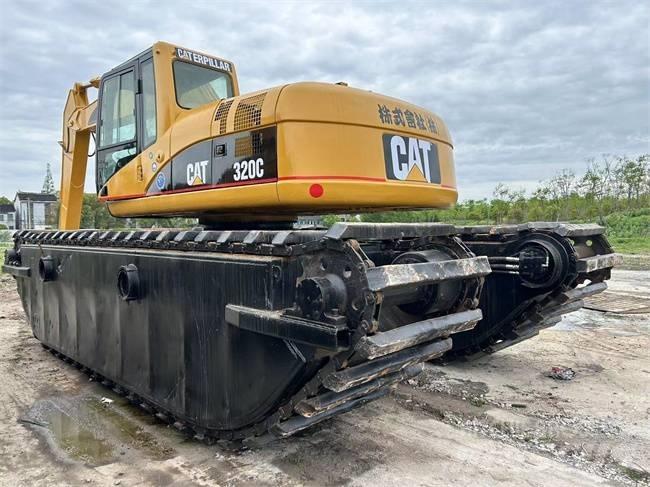 CAT 320 C Amfibijski bagri