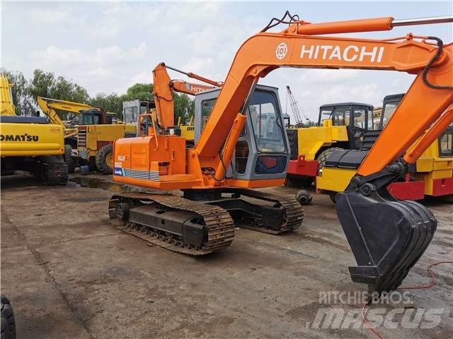 Hitachi EX60 Bagri goseničarji