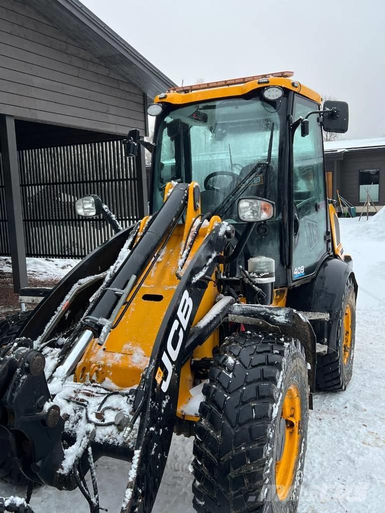 JCB 409 Kolesni nakladalci
