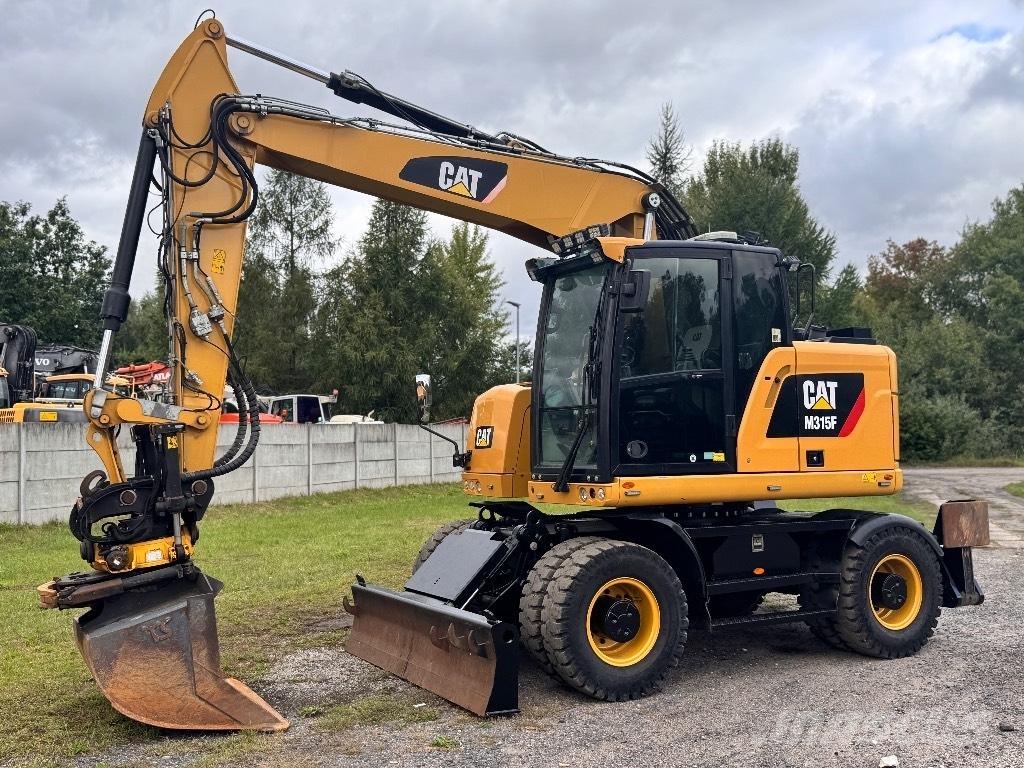 CAT M315F Bagri na kolesih