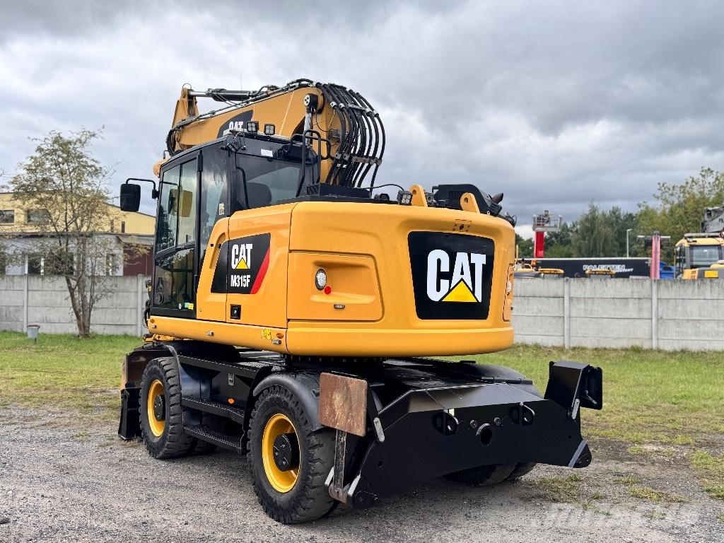 CAT M315F Bagri na kolesih