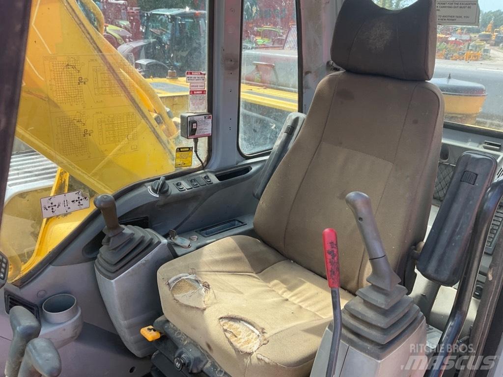 New Holland E 305 Bagri goseničarji