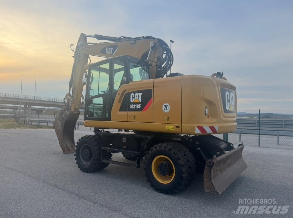CAT M 318 F Bagri na kolesih