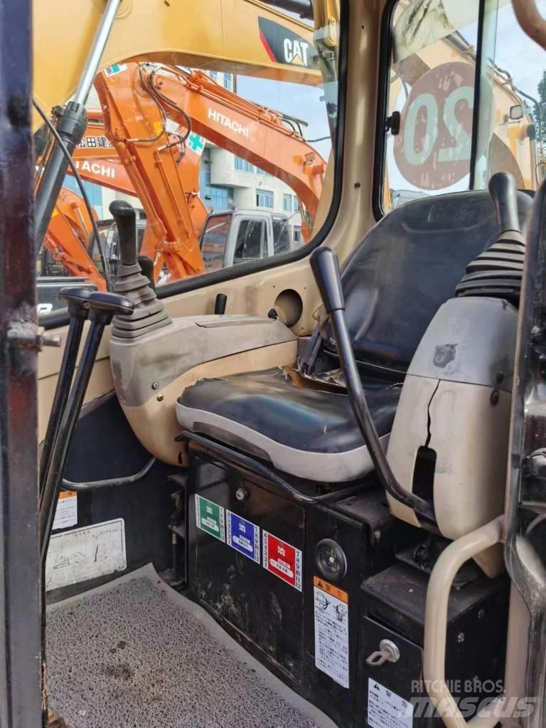 CAT 303 Mini bagri <7t