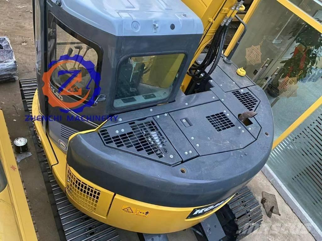 Komatsu PC 128 US Midi bagri 7t – 12t