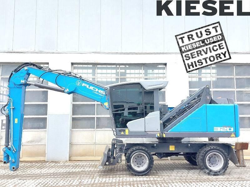 Fuchs MHL 320 F Bagri za prekladanje primarnih/sekundarnih surovin