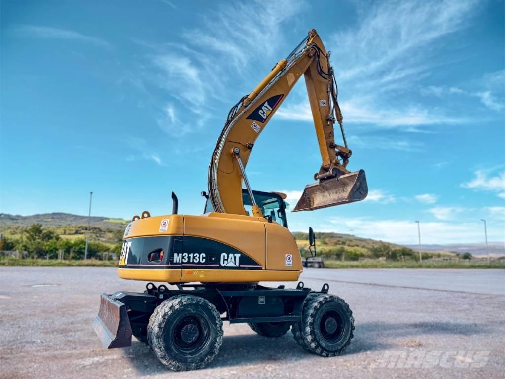 CAT M 313 C Bagri na kolesih