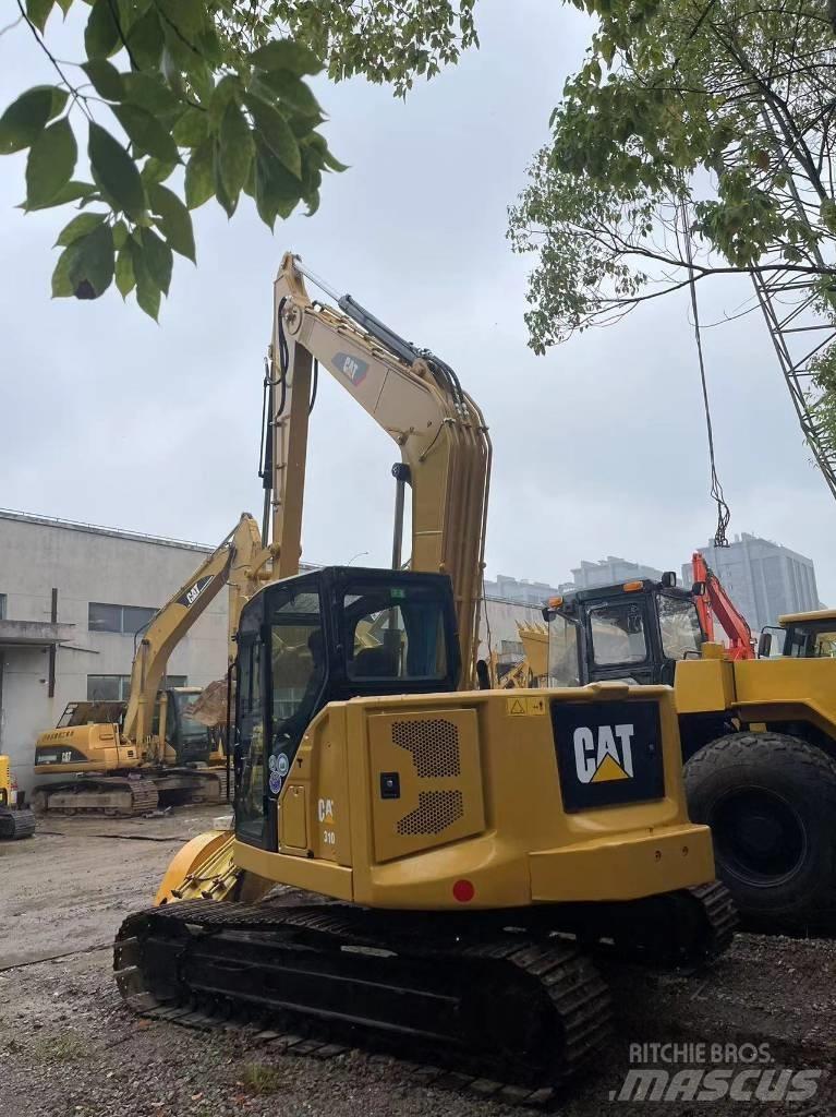 CAT 310 Bagri goseničarji