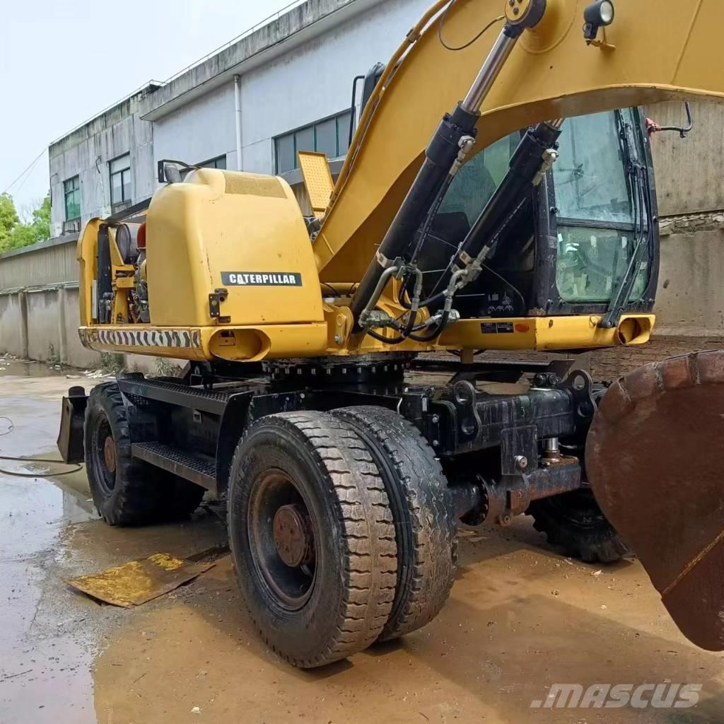 CAT M315D2 Bagri na kolesih