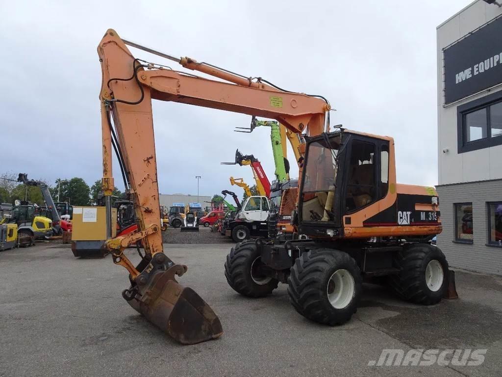 CAT M315 Bagri na kolesih