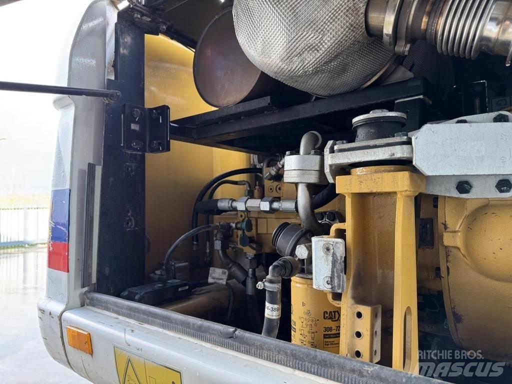 CAT M315D Bagri na kolesih