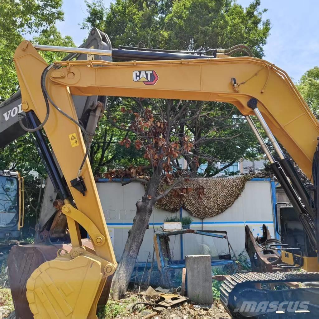 CAT 310 Bagri goseničarji
