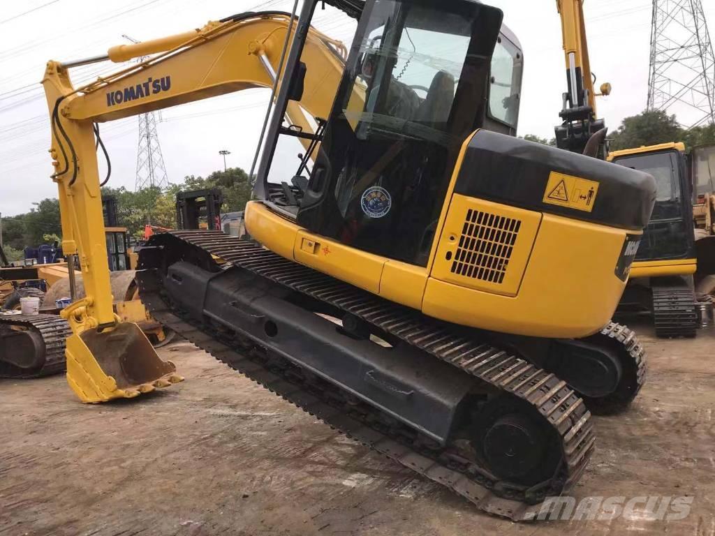 Komatsu PC 128 US Midi bagri 7t – 12t