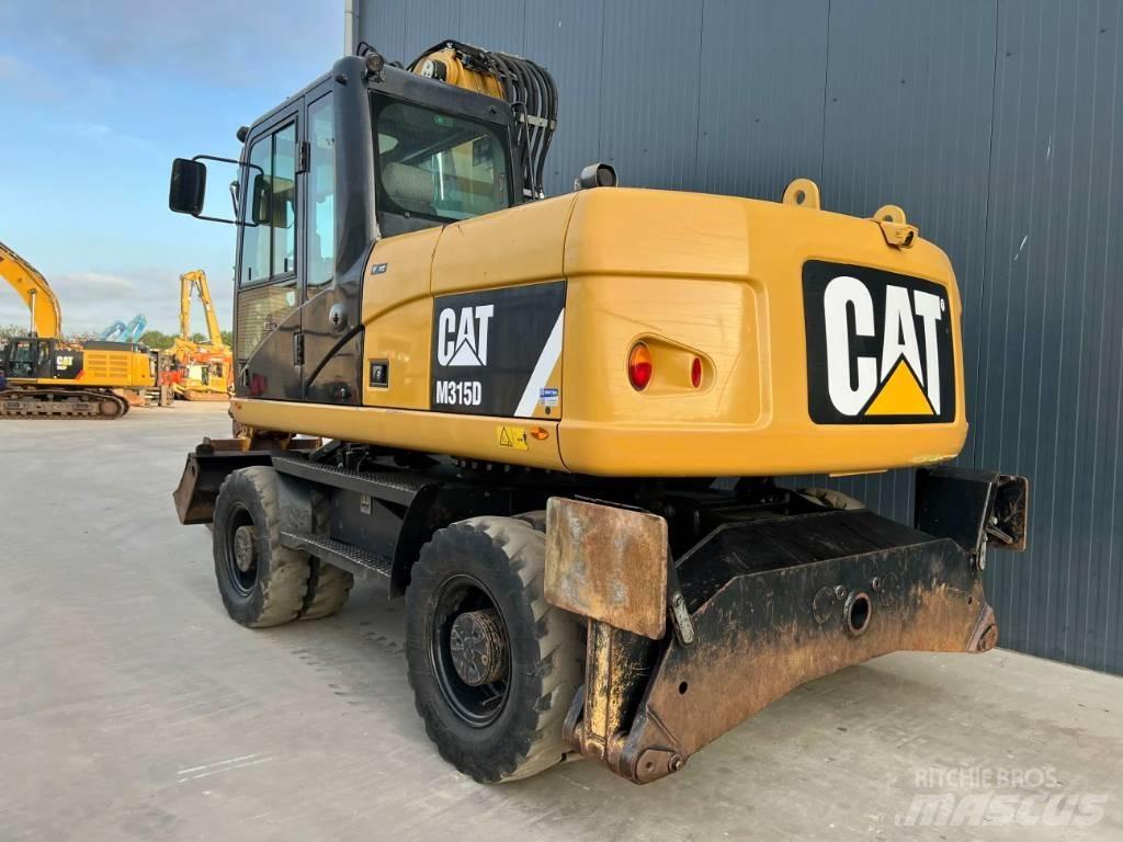 CAT M315D Bagri na kolesih