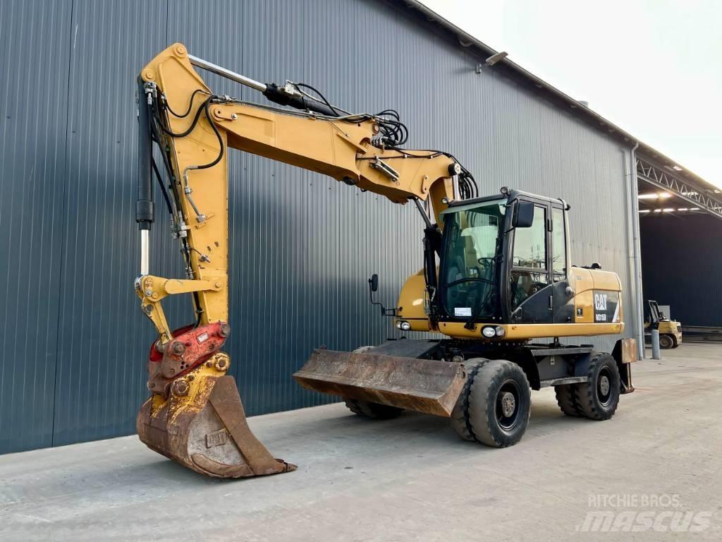 CAT M315D Bagri na kolesih