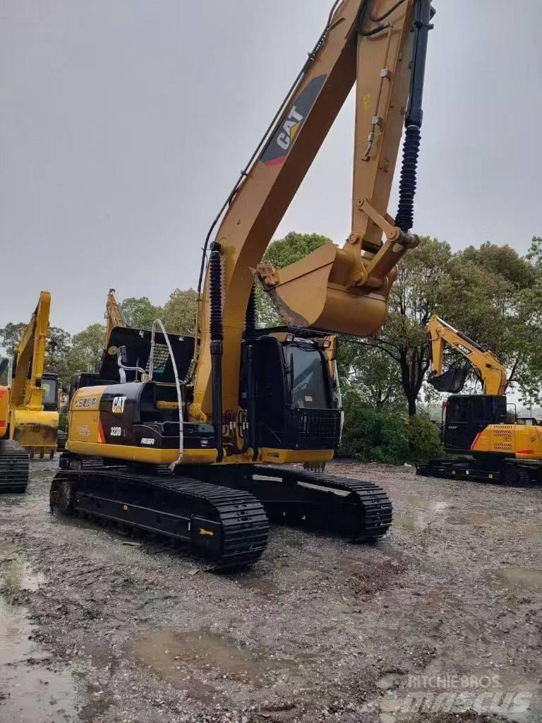 CAT 323D2 Bagri goseničarji