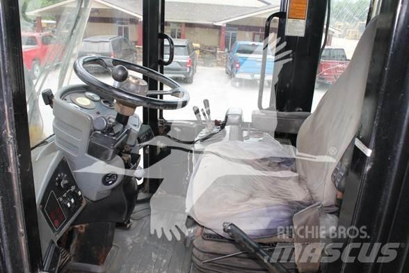CAT IT28G Kolesni nakladalci
