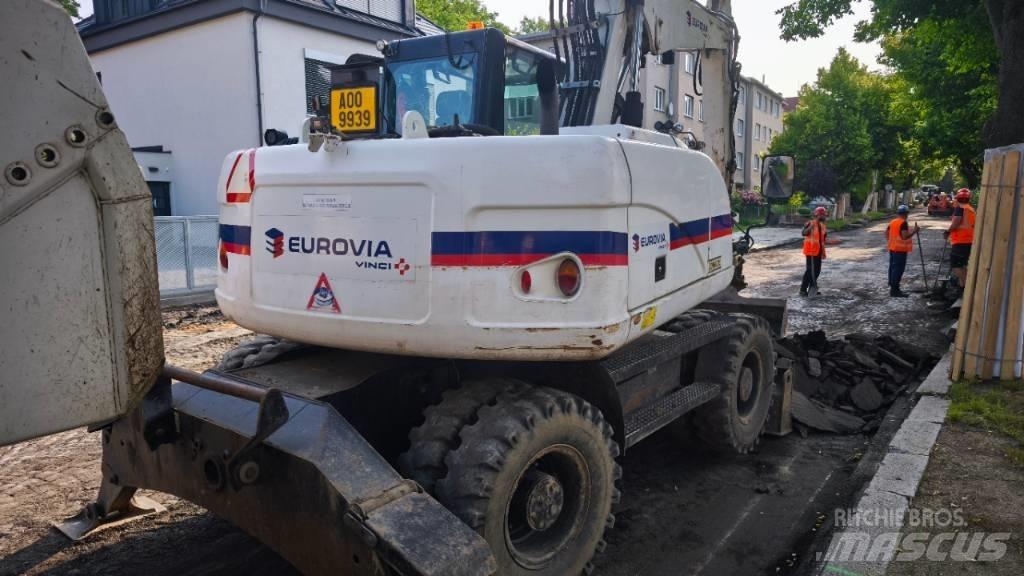CAT 313 D Bagri na kolesih