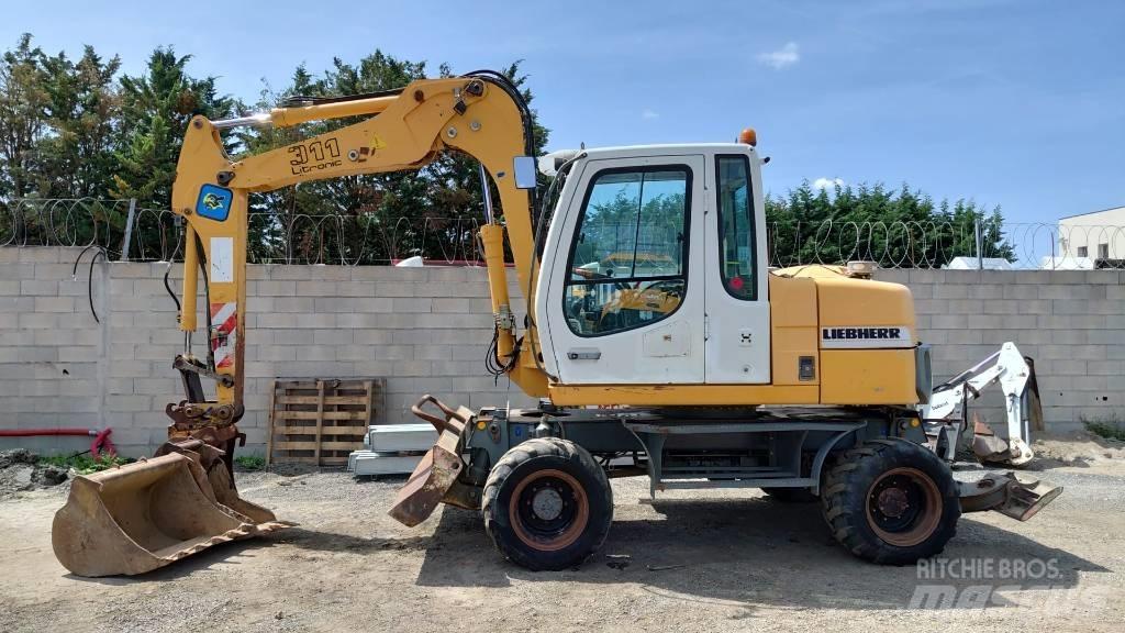 Liebherr A 311 Bagri na kolesih