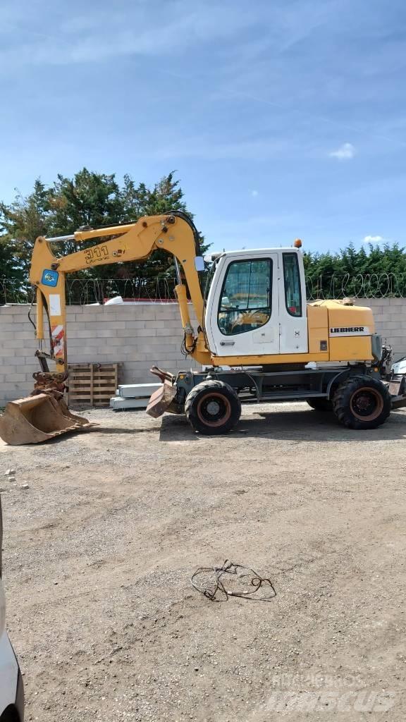 Liebherr A 311 Bagri na kolesih
