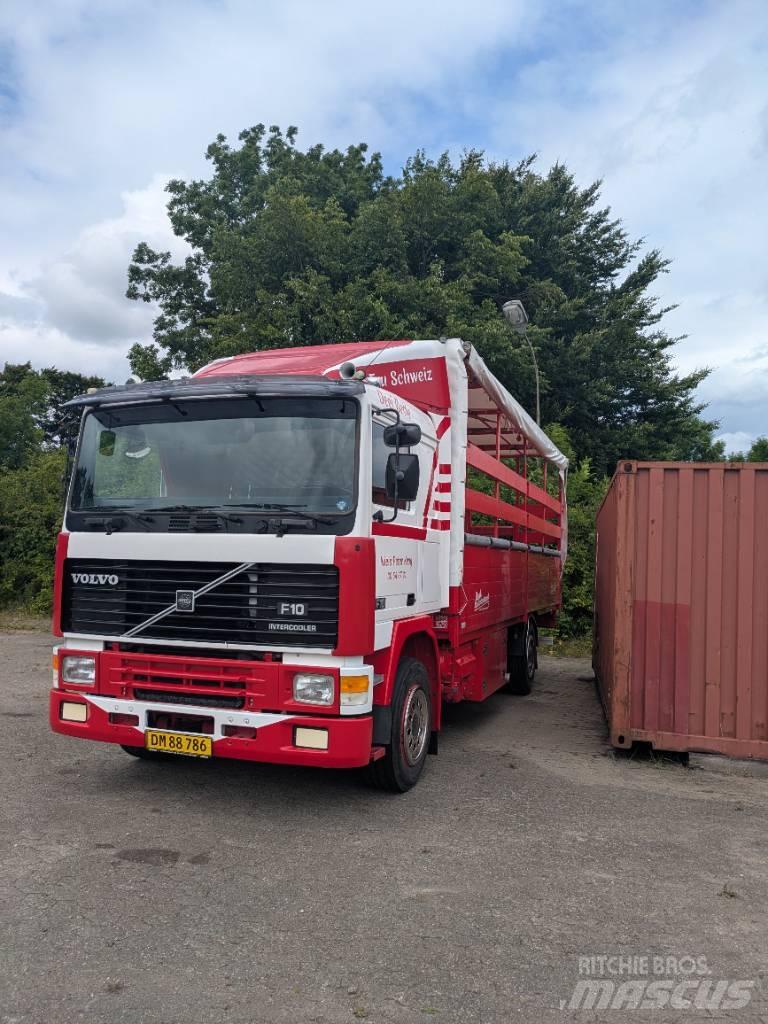 Volvo F 10 Tovornjaki s kesonom/platojem