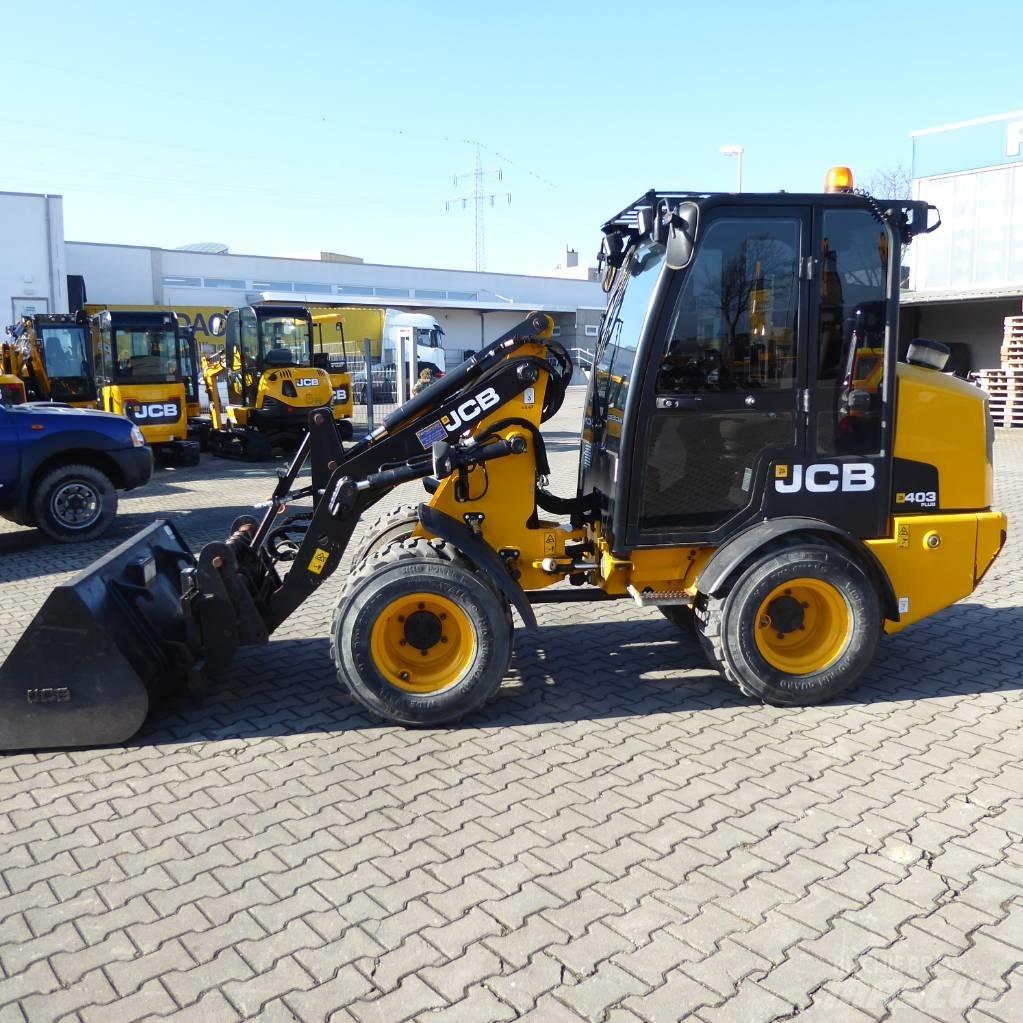 JCB 403 plus Kolesni nakladalci